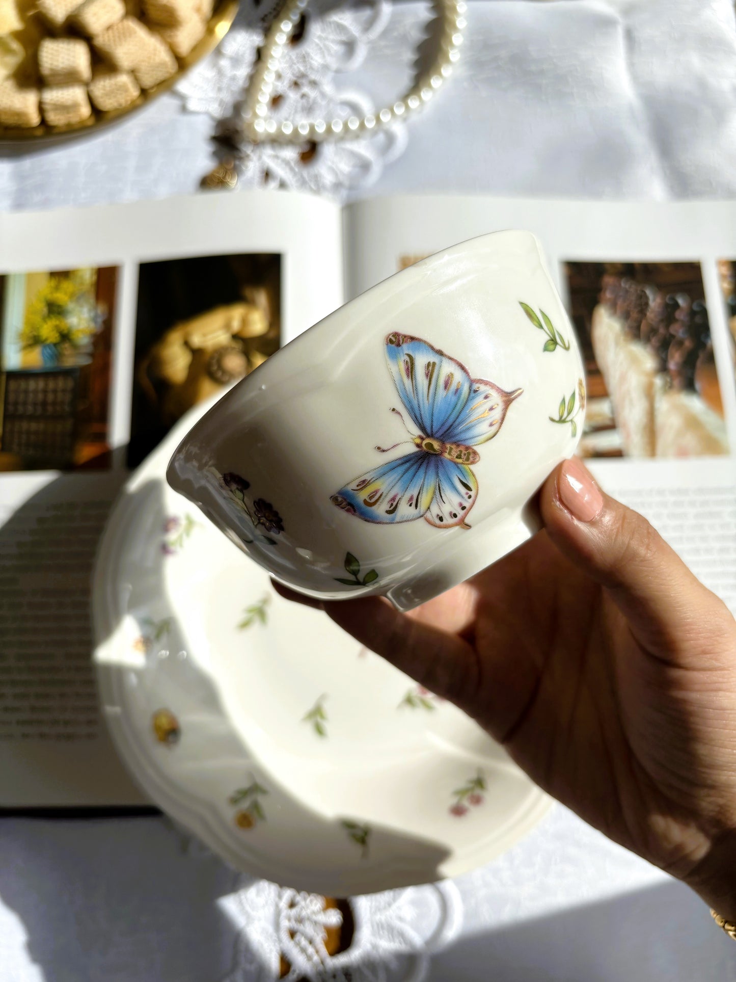 Bone china Enchanted Garden bowl with blue butterfly motif