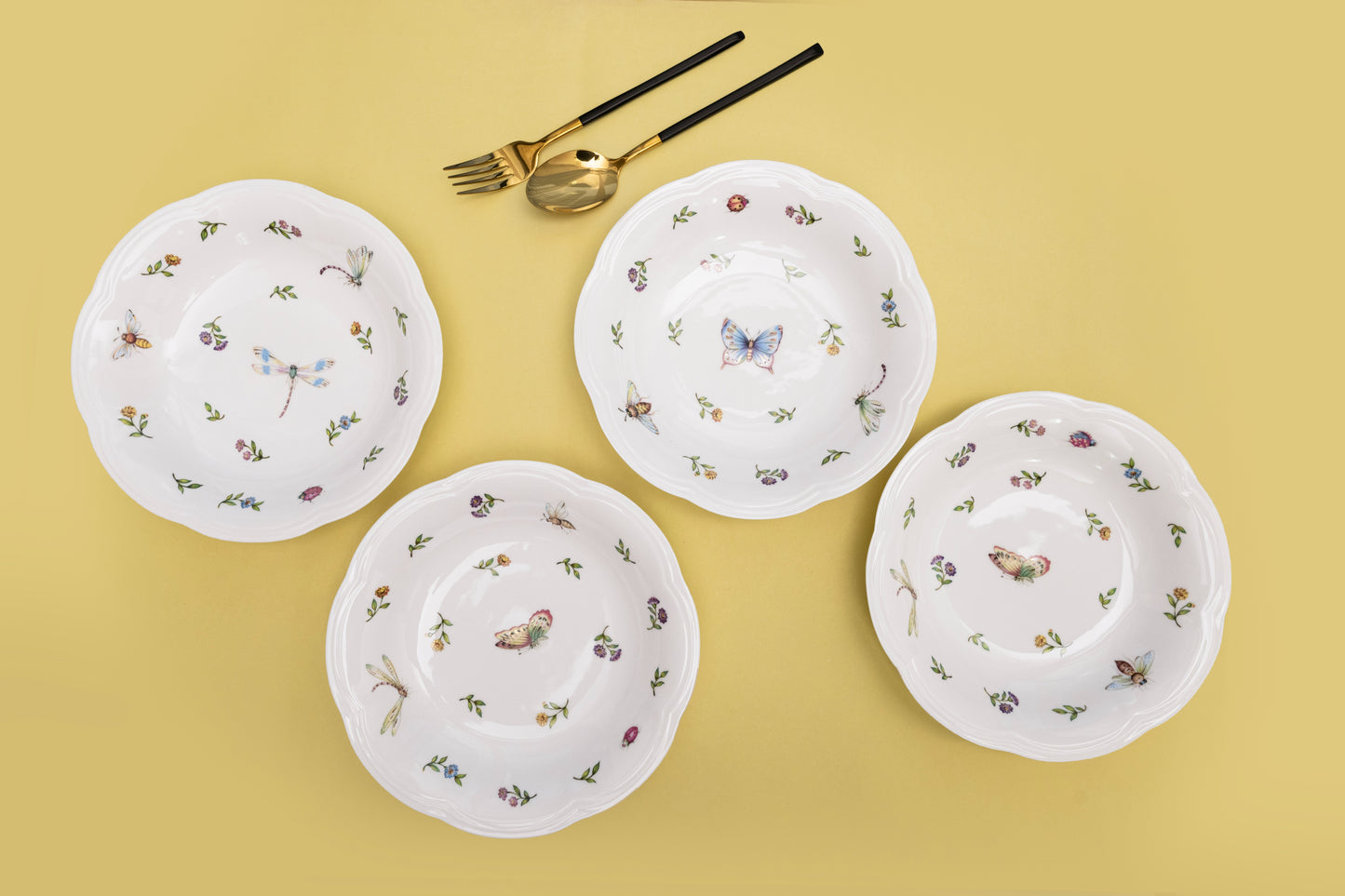 Bone china Enchanted Garden four deep dishes with assorted butterfly, dragonfly, and bee motifs