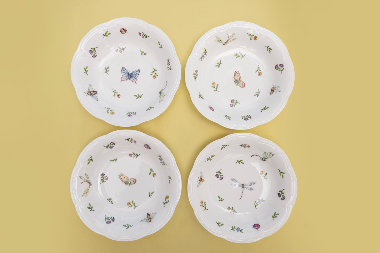 Bone china Enchanted Garden four deep dishes with assorted butterfly and dragonfly motifs