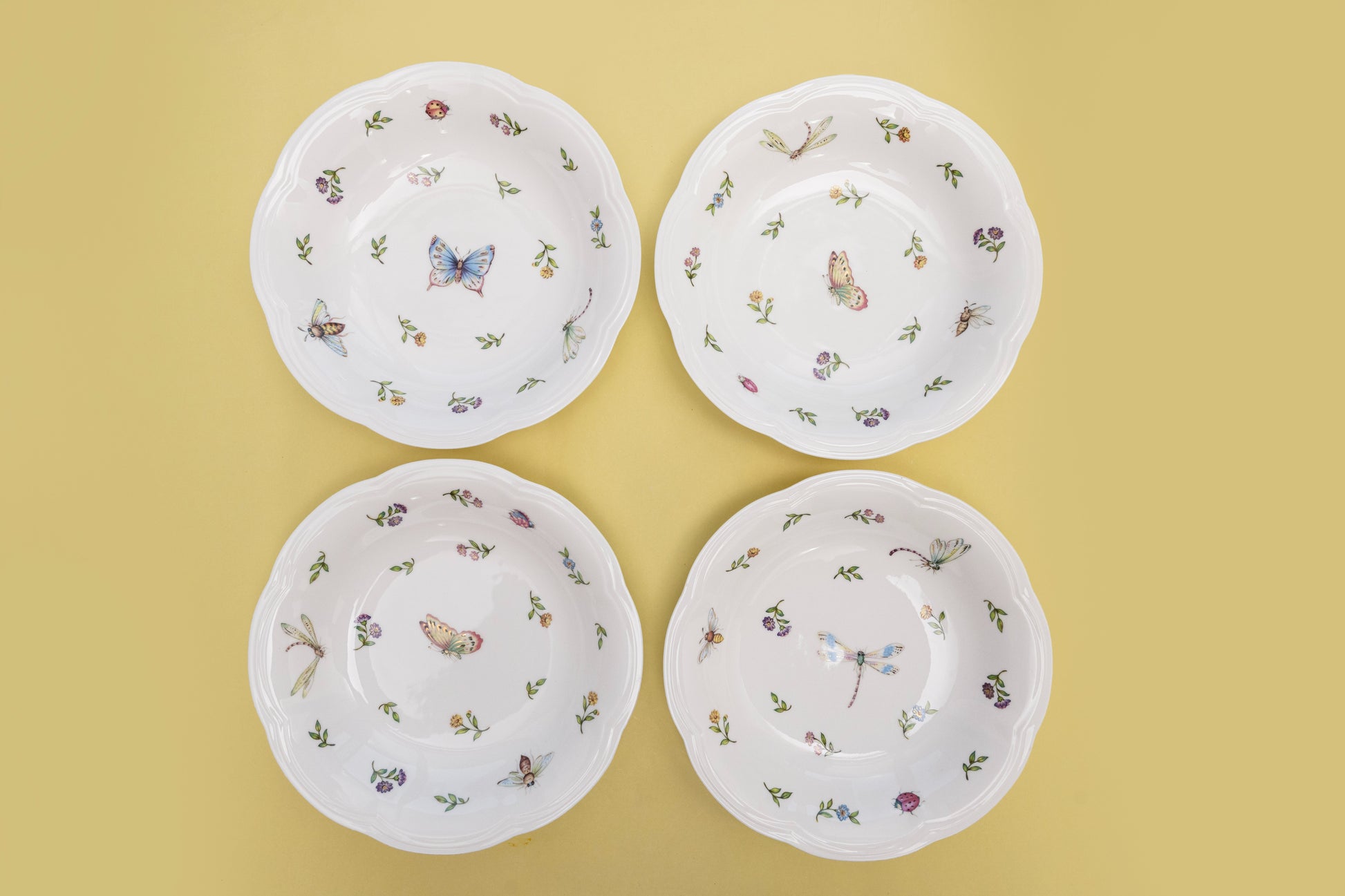 Bone china Enchanted Garden four deep dishes with assorted butterfly and dragonfly motifs