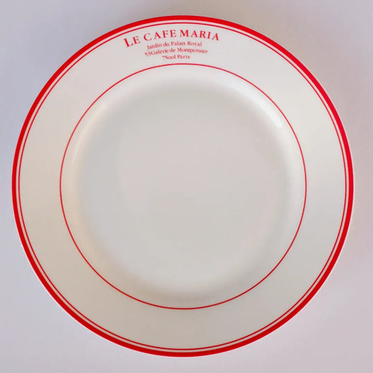 A white bone china quarter plate with double red circular borders and "Le Cafe Maria" printed in red at the top - Birdy Home Design