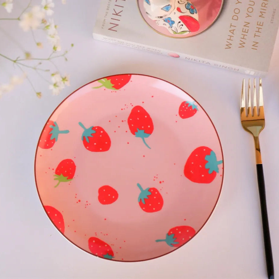 A top-down view of an 8-inch bone china plate featuring a vibrant red strawberry pattern