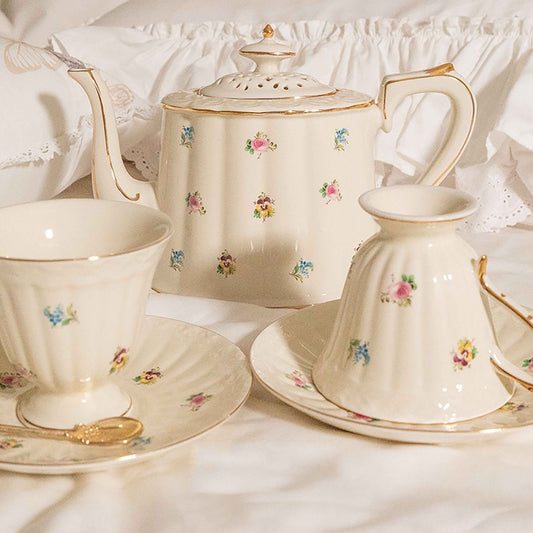 Bone china daisy fields teapot, two cups and saucers with scattered floral motif and gold rim - Birdy Home Design