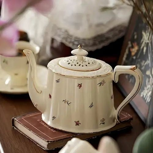 Bone china daisy fields teapot with scattered floral motif and gold rim