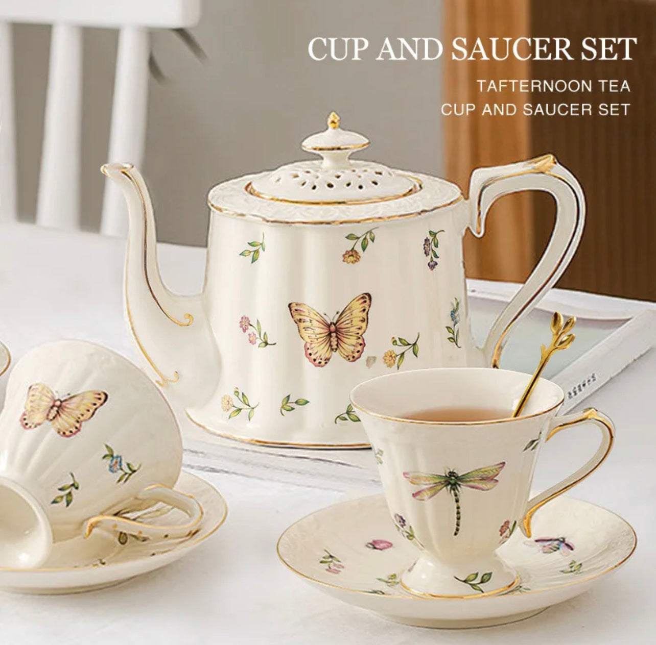Bone china enchanted gardens teapot, two cups and saucers with butterfly and dragonfly motif and gold rim