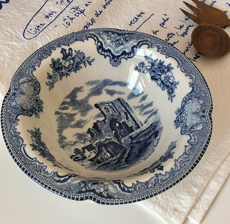Porcelain Royal European Collection bowl with blue and white landscape motif