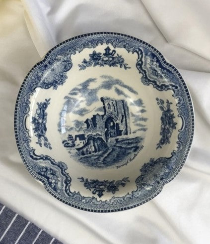 Porcelain Royal European Collection bowl with blue and white landscape motif