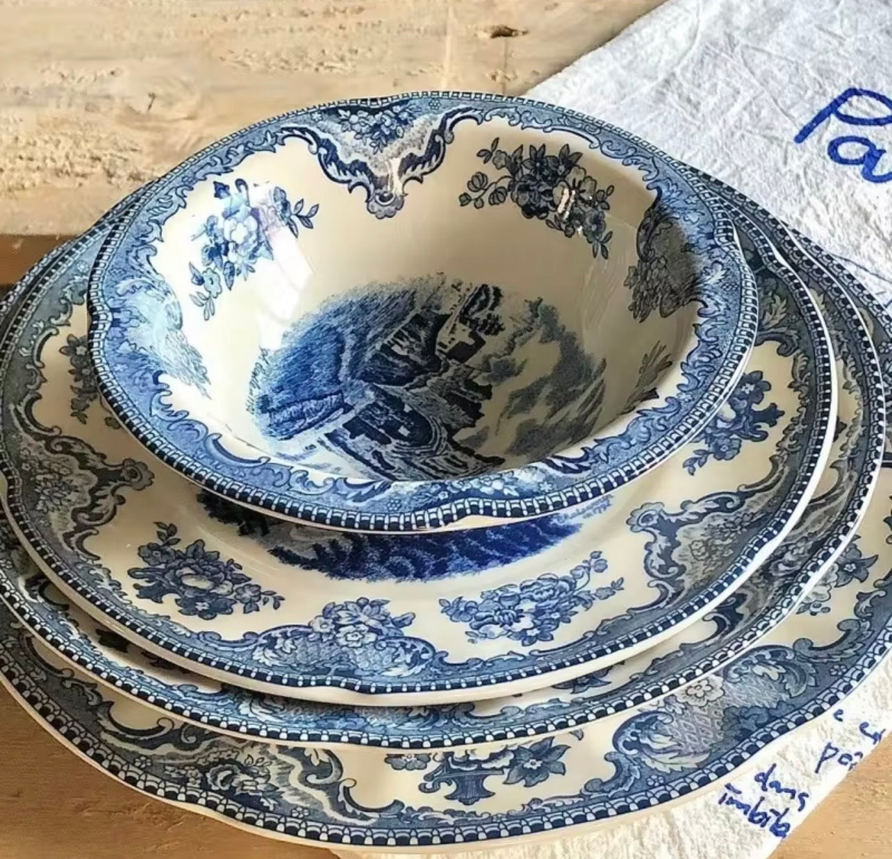 Porcelain Royal European Collection dinner plate, quarter plate, and bowl with blue and white landscape motif